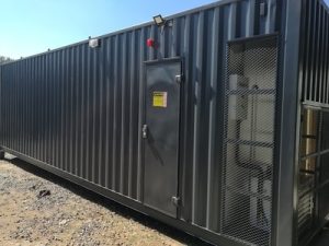 Custom Motor Control Center (MCC) shipping container conversion by ADC Container Solutions, ideal for power distribution and industrial automation.