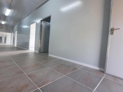 Prefabricated building construction by ADC Container Solutions for efficient and cost-effective structures.
